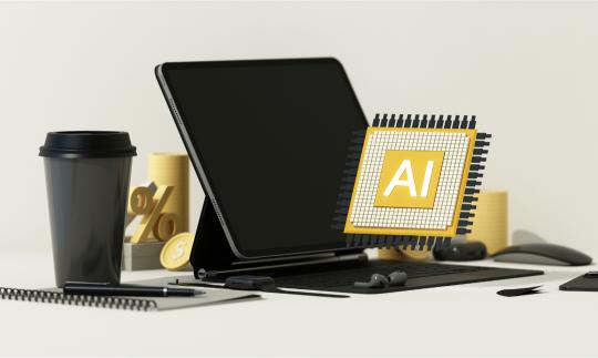 image of the letters AI floating above a desk with a tablet