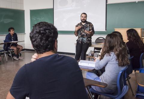 photo of TA teaching a class